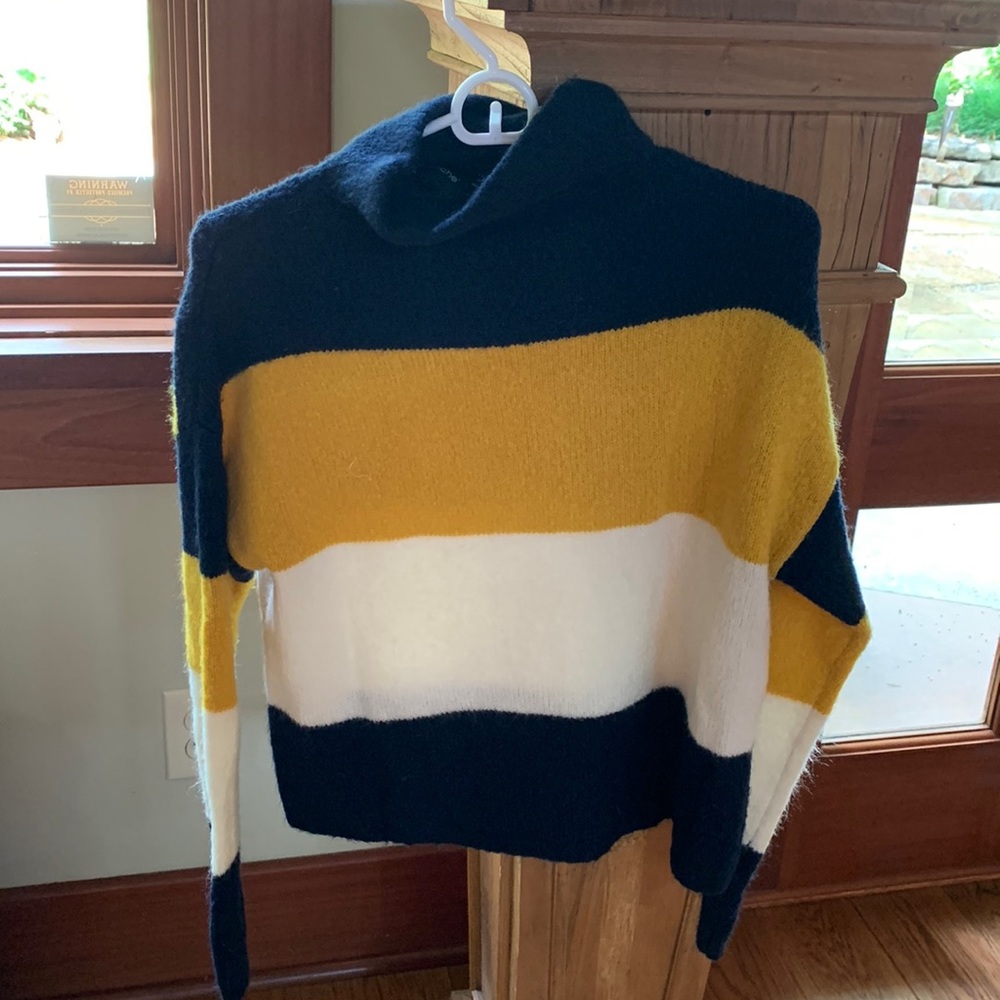 Cliche striped sweater. Size medium. Barely warn.